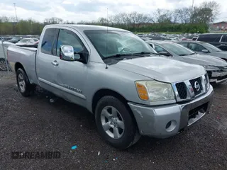 2005 Nissan Titan XE with VIN 1N6BA06A75N567013, listed as a IAAI auction lot 41971758 with 253,664 mi miles. Bid and sale history available at carsss.com. Image 1.