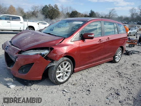 2015 Mazda 5 Grand Touring z VIN JM1CW2DL9F0182785, wystawiony jako Copart lot #83183274 z przebiegiem 71 725 mil mil oraz Szkoda całkowita • Salvage title. Historia ofert i sprzedaży dostępna na DreamBid. Obrazek 1.