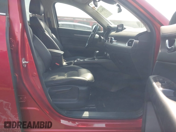 2017 Mazda CX-5 Touring with VIN JM3KFACL3H0195212, listed as a IAAI auction lot 42041361 with 57,377 mi miles and . Bid and sale history available at carsss.com. Image 5.