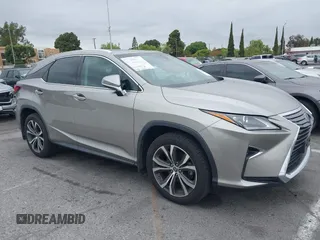 2018 Lexus RX 350 z VIN 2T2ZZMCA2JC098105, wystawiony jako IAAI lot #42200869 z przebiegiem 52 323 mil mil oraz . Historia ofert i sprzedaży dostępna na DreamBid. Obrazek 1.