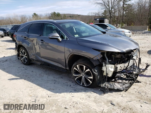 2018 Lexus RX 350L Premium with VIN JTJDZKCA8J2009751, listed as a Copart auction lot 51042215 with 104,454 mi miles and Salvage Title. Bid and sale history available at DreamBid. Image 4.