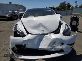 2023 Tesla Model 3 с VIN 5YJ3E1EA3PF575985, выставлен на аукционе Copart как лот 56001075 с пробегом 54 640 миль миль и Списание • Salvage title. История ставок и продаж доступна на DreamBid. Изображение 5.