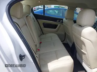 2014 Lincoln MKS z VIN 1LNHL9DK7EG601720, wystawiony jako IAAI lot #42464979 z przebiegiem 58 163 mil mil oraz . Historia ofert i sprzedaży dostępna na DreamBid. Obrazek 8.