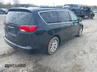 2021 Chrysler Voyager LXi with VIN 2C4RC1DG5MR532190, listed as a IAAI auction lot 42007631 with 101,280 mi miles and . Bid and sale history available at DreamBid. Image 4.