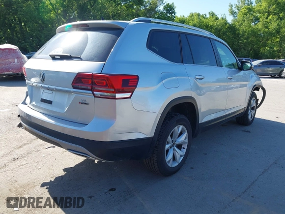 2019 Volkswagen Atlas SE with VIN 1V2UR2CA2KC557449, listed as a IAAI auction lot 42281302 with 106,739 mi miles and . Bid and sale history available at DreamBid. Image 4.