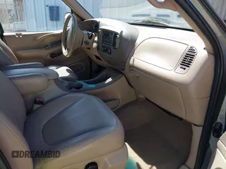 1999 Ford Expedition XLT z VIN 1FMPU18L3XLB91778, wystawiony jako IAAI lot #42266991 z przebiegiem Nie podano mil oraz . Historia ofert i sprzedaży dostępna na DreamBid. Obrazek 5.