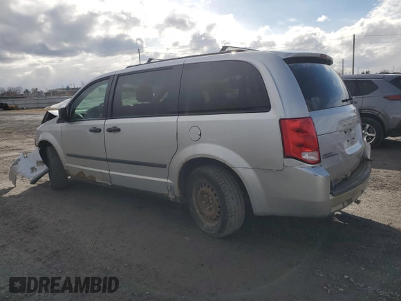 2012 Dodge Grand Caravan SE with VIN 2C4RDGBG8CR137177, listed as a Copart auction lot 49288765 with 389,959 mi miles and Salvage Title. Bid and sale history available at DreamBid. Image 2.