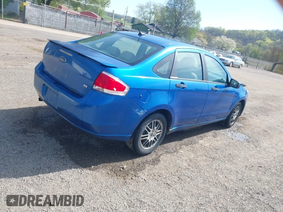 2010 Ford Focus SE with VIN 1FAHP3FNXAW159048, listed as a IAAI auction lot 42103062 with 142,810 mi miles. Bid and sale history available at carsss.com. Image 4.
