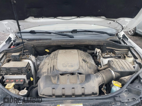 2013 Jeep Grand Cherokee Overland with VIN 1C4RJFCT4DC640553, listed as a IAAI auction lot 41311413 with 146,212 mi miles. Bid and sale history available at carsss.com. Image 10.