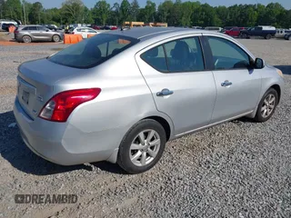 2012 Nissan Versa SV with VIN 3N1CN7APXCL867337, listed as a IAAI auction lot 42079349 with 260,442 mi miles. Bid and sale history available at carsss.com. Image 4.