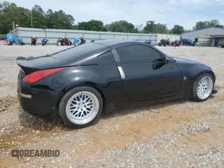 2003 Nissan 350Z Touring z VIN JN1AZ34E53T005833, wystawiony jako Copart lot #55437345 z przebiegiem 144 141 mil mil oraz Szkoda całkowita • Salvage title. Historia ofert i sprzedaży dostępna na DreamBid. Obrazek 3.