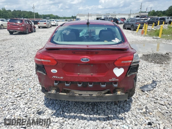 2016 Ford Focus SE with VIN 1FADP3F20GL249260, listed as a Copart auction lot 57315955 with 108,448 mi miles and Salvage title. Bid and sale history available at DreamBid. Image 6.