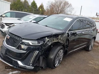 2021 Cadillac XT6 Premium Luxury z VIN 1GYKPDRS9MZ120150, wystawiony jako IAAI lot #41715368 z przebiegiem 47 835 mil mil oraz . Historia ofert i sprzedaży dostępna na DreamBid. Obrazek 15.