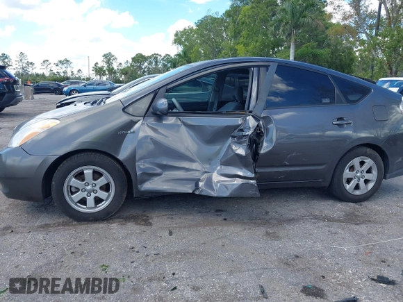 2009 Toyota Prius with VIN JTDKB20U693486715, listed as a IAAI auction lot 41689082 with 154,482 mi miles. Bid and sale history available at carsss.com. Image 6.