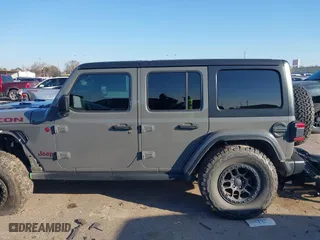 2021 Jeep Wrangler Unlimited Rubicon with VIN 1C4JJXFG3MW842686, listed as a IAAI auction lot 41517391 with 44,127 mi miles. Bid and sale history available at carsss.com. Image 15.