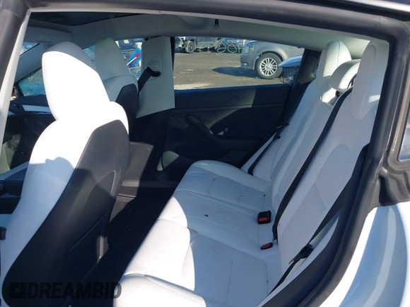 2023 Tesla Model 3 z VIN 5YJ3E1EA4PF505850, wystawiony jako IAAI lot #41310597 z przebiegiem 70 211 mil mil oraz . Historia ofert i sprzedaży dostępna na DreamBid. Obrazek 8.