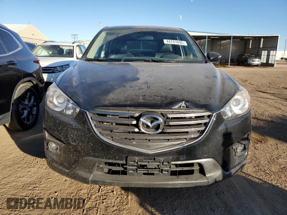 2016 Mazda CX-5 Grand Touring with VIN JM3KE4DY0G0731384, listed as a Copart auction lot 44741695 with 58,727 mi miles and Salvage Title. Bid and sale history available at carsss.com. Image 5.