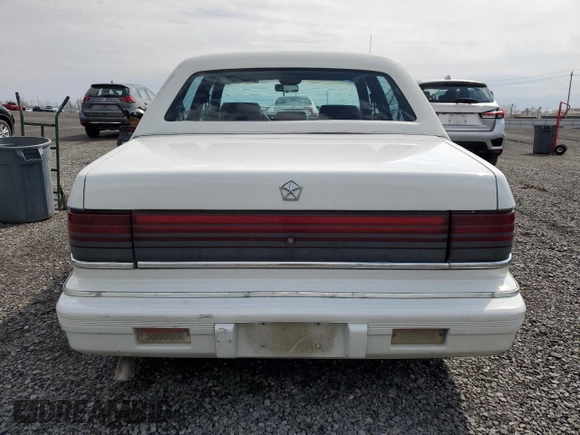 1992 Chrysler LeBaron z VIN 3C3XA5633NT336573, wystawiony jako Copart lot #54551495 z przebiegiem Nie podano mil oraz Tytuł czysty. Historia ofert i sprzedaży dostępna na DreamBid. Obrazek 6.