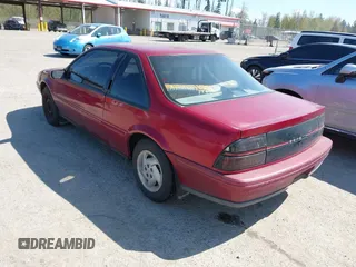 1994 Chevrolet Beretta z VIN 1G1LV15M9RY253342, wystawiony jako IAAI lot #42047160 z przebiegiem 131 763 mil mil oraz . Historia ofert i sprzedaży dostępna na DreamBid. Obrazek 3.