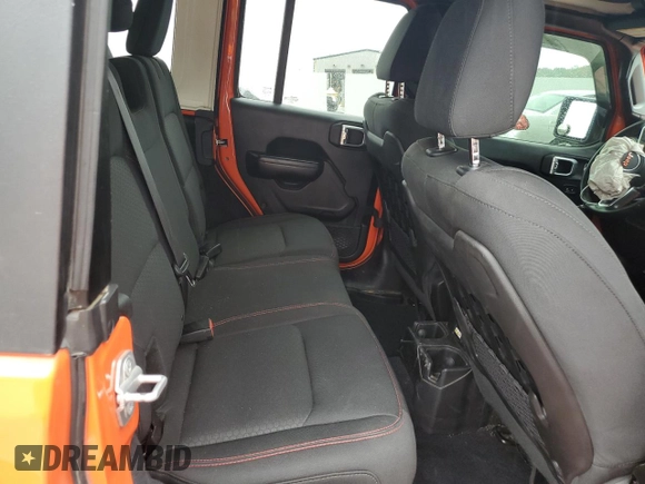 2018 Jeep Wrangler Unlimited Rubicon with VIN 1C4HJXFG7JW287624, listed as a Copart auction lot 59006895 with 64,871 mi miles and Salvage title. Bid and sale history available at DreamBid. Image 11.