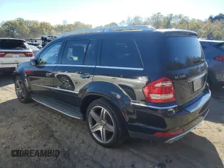 2011 Mercedes-Benz GL-Class GL 550 with VIN 4JGBF8GE2BA696439, listed as a Copart auction lot 74685374 with 56,766 mi miles and Salvage Title. Bid and sale history available at carsss.com. Image 2.