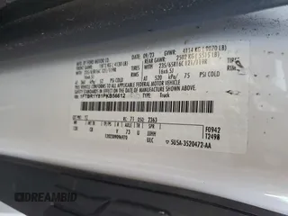 2023 Ford Transit Cargo with VIN 1FTBR1Y81PKB56612, listed as a Copart auction lot 46652685 with Not Provided miles and Salvage Title. Bid and sale history available at DreamBid. Image 13.
