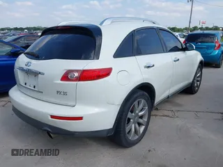 2004 Infiniti FX35 with VIN JNRAS08W34X220026, listed as a IAAI auction lot 42058535 with 168,328 mi miles. Bid and sale history available at carsss.com. Image 4.