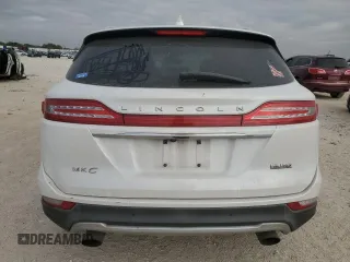 2019 Lincoln MKC Standard with VIN 5LMCJ1D95KUL45392, listed as a Copart auction lot 82561394 with 104,748 mi miles and Salvage Title. Bid and sale history available at DreamBid. Image 6.