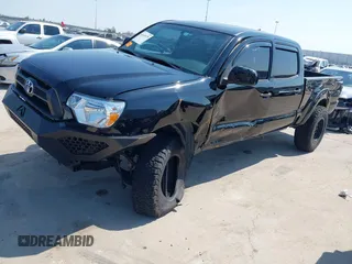 2014 Toyota Tacoma PreRunner with VIN 3TMKU4HN0EM040104, listed as a IAAI auction lot 41619179 with 171,542 mi miles and . Bid and sale history available at DreamBid. Image 17.