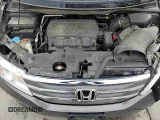 2012 Honda Odyssey Touring with VIN 5FNRL5H94CB109257, listed as a Copart auction lot 59636075 with 107,543 mi miles and Salvage title. Bid and sale history available at DreamBid. Image 12.