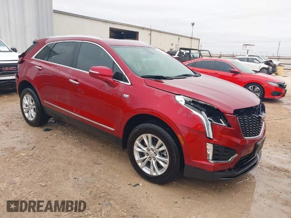 2023 Cadillac XT5 FWD Luxury z VIN 1GYKNAR42PZ147121, wystawiony jako IAAI lot #41315848 z przebiegiem 10 444 mil mil oraz . Historia ofert i sprzedaży dostępna na DreamBid. Obrazek 1.