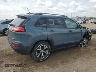2015 Jeep Cherokee Trailhawk with VIN 1C4PJMBB1FW630715, listed as a Copart auction lot 58559675 with 58,302 mi miles and Salvage title. Bid and sale history available at DreamBid. Image 3.