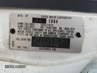1984 Toyota Camry z VIN JT2SV16E3E0220882, wystawiony jako Copart lot #53514345 z przebiegiem 112 430 mil mil oraz Czysty tytuł • Clean title. Historia ofert i sprzedaży dostępna na DreamBid. Obrazek 12.