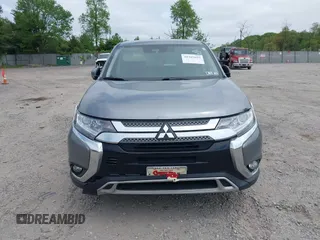 2020 Mitsubishi Outlander SE z VIN JA4AD3A37LZ044719, wystawiony jako IAAI lot #39303659 z przebiegiem 86 662 mil mil oraz . Historia ofert i sprzedaży dostępna na DreamBid. Obrazek 11.
