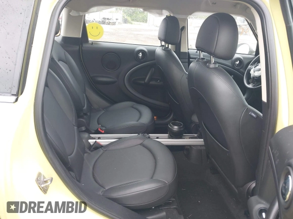 2012 MINI Countryman S z VIN WMWZC3C59CWL82955, wystawiony jako IAAI lot #42237702 z przebiegiem 61 903 mil mil oraz . Historia ofert i sprzedaży dostępna na DreamBid. Obrazek 8.