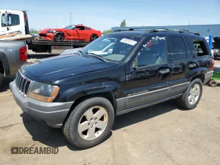 2001 Jeep Grand Cherokee Laredo with VIN 1J4GW48S91C728307, listed as a Copart auction lot 54629574 with 224,281 mi miles and Salvage title. Bid and sale history available at DreamBid. Image 1.