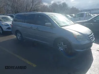 2006 Honda Odyssey EX-L with VIN 5FNRL386X6B018587, listed as a IAAI auction lot 41725966 with 168,215 mi miles. Bid and sale history available at carsss.com. Image 1.