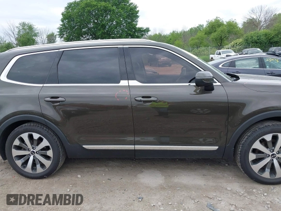 2020 Kia Telluride EX z VIN 5XYP3DHC6LG091463, wystawiony jako IAAI lot #42530329 z przebiegiem 69 824 mil mil oraz . Historia ofert i sprzedaży dostępna na DreamBid. Obrazek 13.
