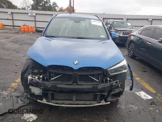 2016 BMW X1 xDrive28i with VIN WBXHT3C31G5E55119, listed as a IAAI auction lot 40894704 with 126,561 mi miles. Bid and sale history available at carsss.com. Image 12.