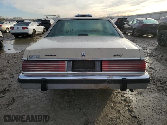 1987 Mercury Grand Marquis GS z VIN 2MEBM74F9HX714211, wystawiony jako Copart lot #43594205 z przebiegiem 26 933 mil mil oraz Szkody całkowita. Historia ofert i sprzedaży dostępna na DreamBid. Obrazek 6.