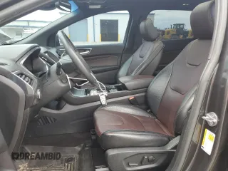2020 Ford Edge Titanium with VIN 2FMPK3K9XLBB03754, listed as a Copart auction lot 59228775 with 63,034 mi miles and Salvage title. Bid and sale history available at DreamBid. Image 7.