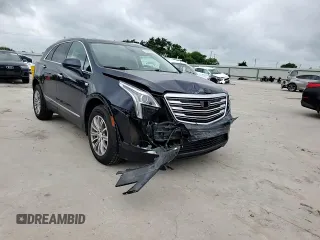 2017 Cadillac XT5 Luxury AWD z VIN 1GYKNDRS1HZ121319, wystawiony jako Copart lot #54938505 z przebiegiem 71 519 mil mil oraz Szkoda całkowita • Salvage title. Historia ofert i sprzedaży dostępna na DreamBid. Obrazek 13.