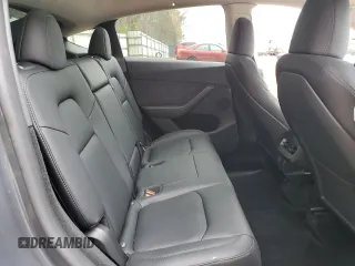 2023 Tesla Model Y Long Range z VIN 7SAYGDEE5PA164270, wystawiony jako Copart lot #50260835 z przebiegiem 17 340 mil mil oraz Szkoda całkowita • Salvage title. Historia ofert i sprzedaży dostępna na DreamBid. Obrazek 11.