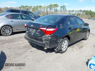 2016 Toyota Corolla L with VIN 5YFBURHEXGP406823, listed as a IAAI auction lot 41798717 with 156,423 mi miles and . Bid and sale history available at DreamBid. Image 4.