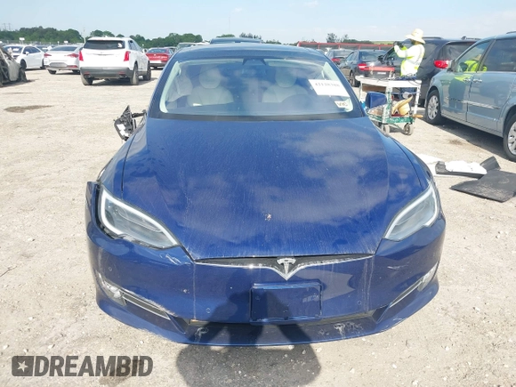 2017 Tesla Model S 100D with VIN 5YJSA1E28HF217489, listed as a IAAI auction lot 42128388 with Not provided miles and . Bid and sale history available at DreamBid. Image 13.