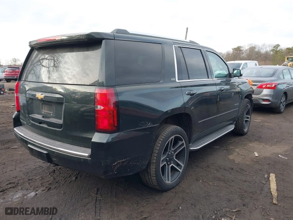 2016 Chevrolet Tahoe LTZ with VIN 1GNSKCKC1GR297871, listed as a IAAI auction lot 41442380 with 91,354 mi miles. Bid and sale history available at carsss.com. Image 4.