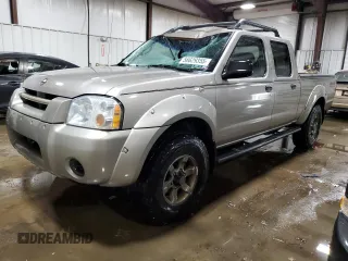 2004 Nissan Frontier XE z VIN 1N6ED29Y64C419454, wystawiony jako Copart lot #56629355 z przebiegiem 214 296 mil mil oraz Szkoda całkowita • Salvage title. Historia ofert i sprzedaży dostępna na DreamBid. Obrazek 1.