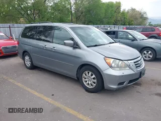 2009 Honda Odyssey EX-L with VIN 5FNRL38629B033203, listed as a IAAI auction lot 42172416 with 261,270 mi miles. Bid and sale history available at carsss.com. Image 1.