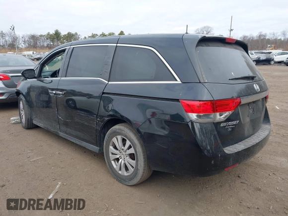 2015 Honda Odyssey EX-L with VIN 5FNRL5H60FB011806, listed as a IAAI auction lot 41791543 with 161,116 mi miles and . Bid and sale history available at DreamBid. Image 3.