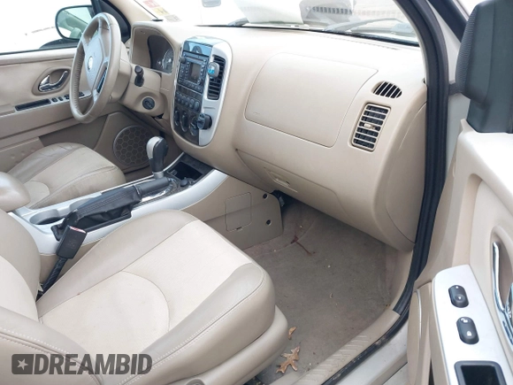 2007 Mercury Mariner with VIN 4M2CU39H97KJ18357, listed as a IAAI auction lot 41378708 with 118,381 mi miles. Bid and sale history available at carsss.com. Image 5.